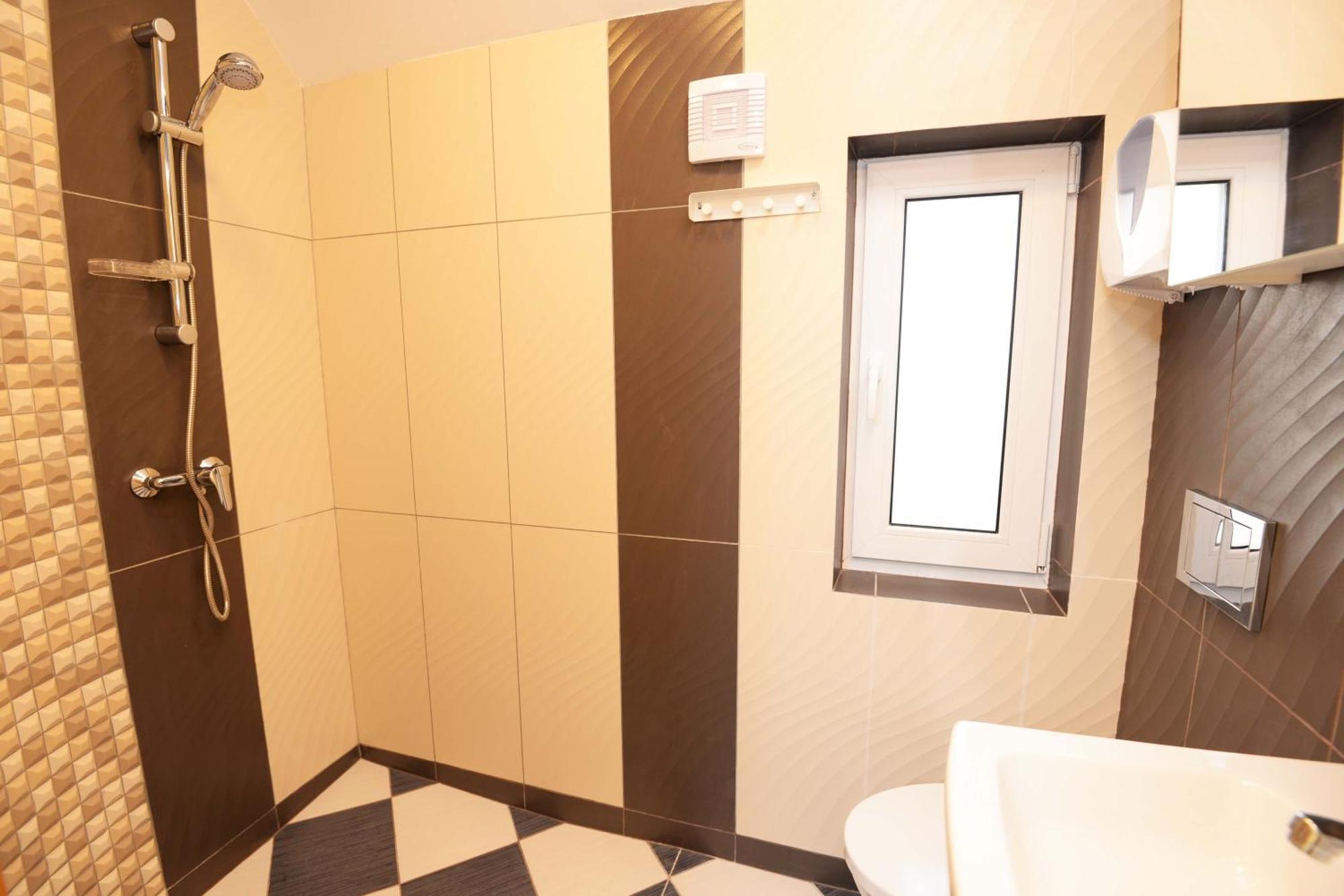 Inkaras Aparthotel Паланга Стая снимка